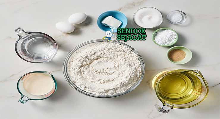 Bahan resep New Orleans beignets dengan tepung dan ragi.