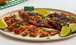 Blackened chicken autentik dari Sendok Sejagat dengan bumbu Cajun di piring.
