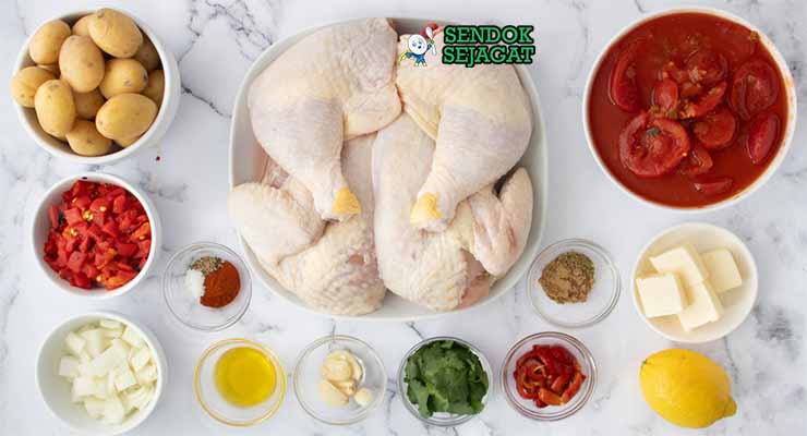 Bahan Piri-Piri Chicken dengan cabai dan lemon.