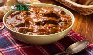 Wallaby Stew Sendok Sejagat dengan wattleseed.