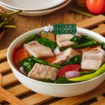 Sinigang na Baboy Sendok Sejagat dengan tamarind.