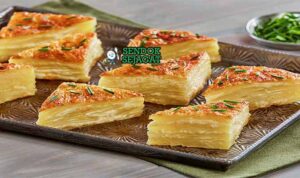 Potato Dauphinoise dengan Keju Lumer Prancis.