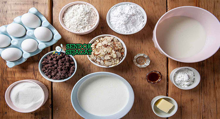 Bahan-bahan untuk Boston Cream Pie, termasuk telur dan cokelat