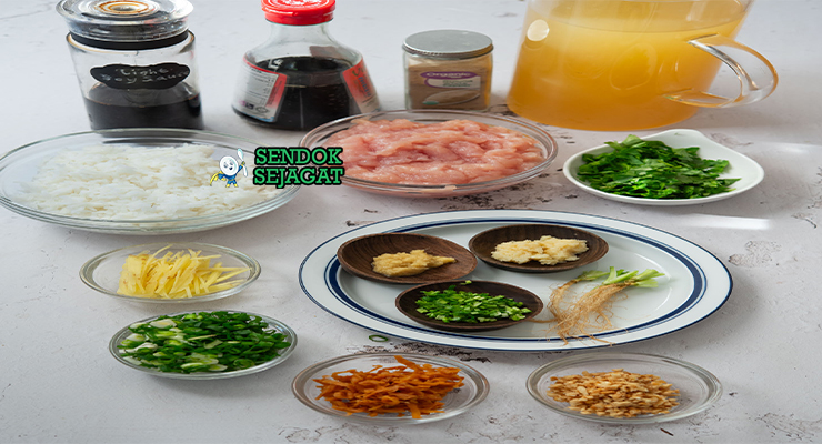 Bahan-bahan untuk Khao Tom, termasuk nasi, daging babi, dan kecap ikan