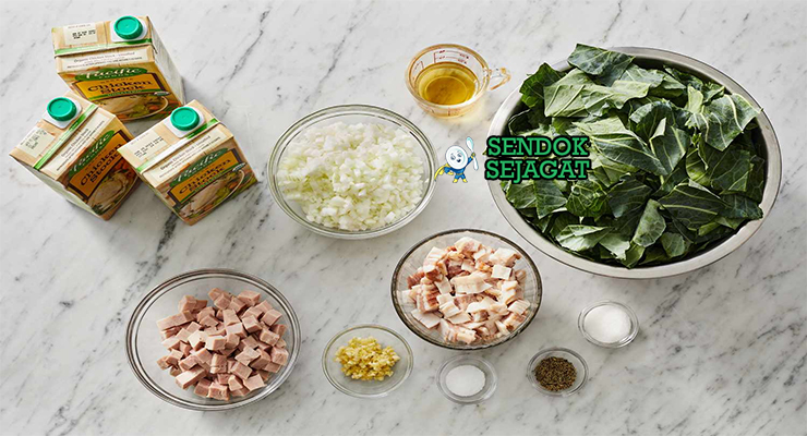 Bahan-bahan untuk Liberian Collard Greens, termasuk daun collard dan ikan asap