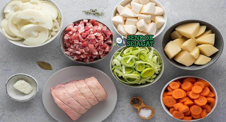 Bahan-bahan untuk Welsh Cawl, termasuk daging domba dan wortel