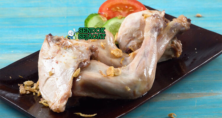 Ayam Pop khas Minangkabau dengan sambal merah dan daun singkong