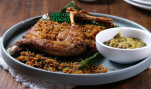 Bebek Sinjay dengan sambal pencit, nasi, dan lalapan