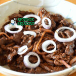Filipino Bistek Tagalog dengan daging sapi dan bawang bombay