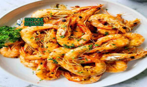 Butter Garlic Prawns Singapura dengan saus mentega dan nasi