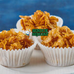 Australian Honey Joys dalam cup kertas dengan cornflakes renyah