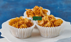 Australian Honey Joys dalam cup kertas dengan cornflakes renyah