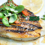 John Dory Panggang Australia dengan lemon dan salad segar