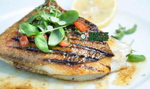 John Dory Panggang Australia dengan lemon dan salad segar