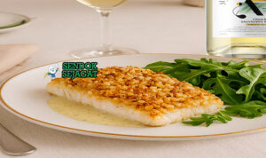 Australian Macadamia Crusted Barramundi dengan lapisan kacang renyah