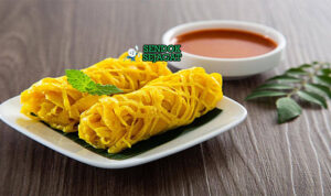 Malaysian Roti Jala dengan kari ayam dan acar timun