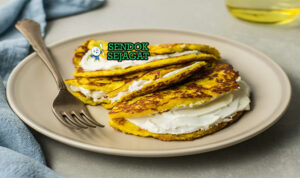 Venezuelan Cachapa dengan keju meleleh dan mentega