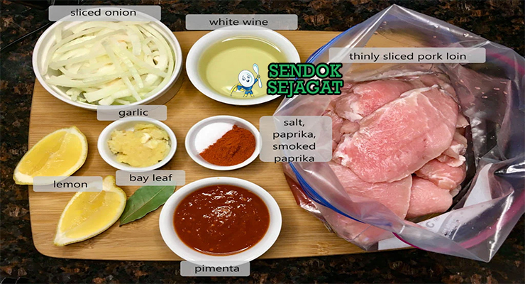 Bahan-bahan untuk Portuguese Bifana, termasuk daging babi dan roti