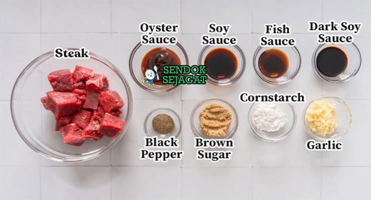 Bahan-bahan untuk Vietnamese Bò Lúc Lắc, termasuk daging sapi dan saus ikan