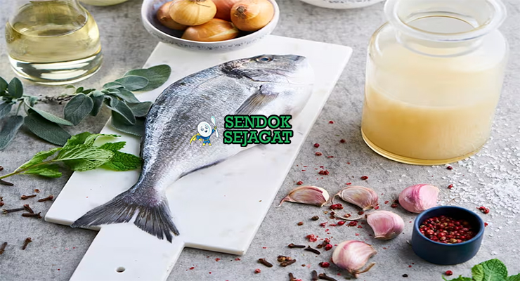 Bahan-bahan untuk Caldo de Peixe, termasuk ikan dan tomat