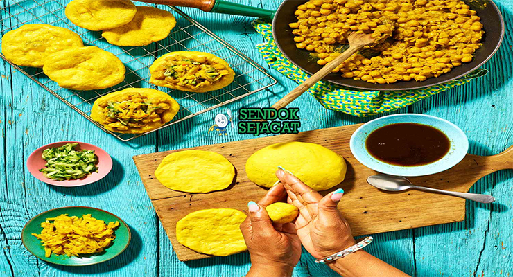 Bahan-bahan untuk Doubles, termasuk chickpeas dan tepung