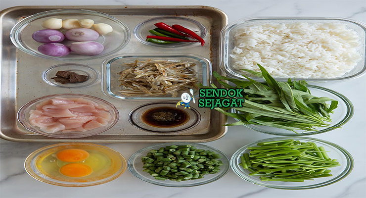 Bahan-bahan untuk Malaysian Nasi Goreng Kampung, termasuk ikan bilis dan kangkung