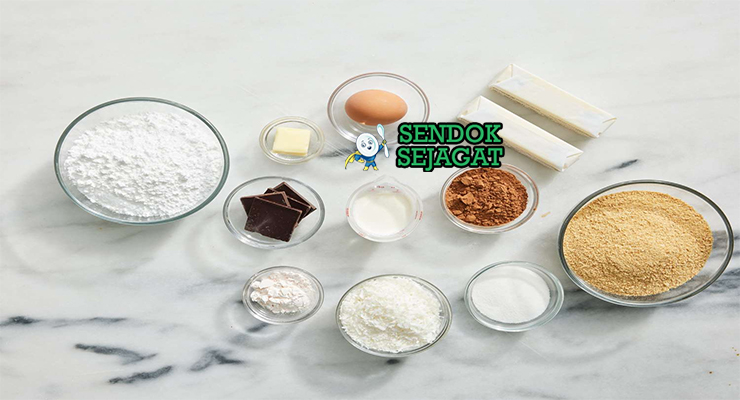 Bahan-bahan untuk Nanaimo Bars, termasuk cokelat dan kelapa parut