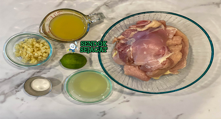 Bahan-bahan untuk Pollo a la Plancha, termasuk ayam dan cabai
