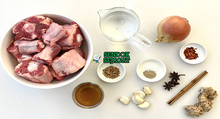 Bahan-bahan untuk Sop Buntut Goreng, termasuk buntut sapi dan wortel