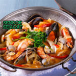 Cataplana de Mariscos dengan udang dan kerang