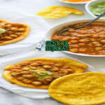 Doubles dengan roti renyah dan channa kental