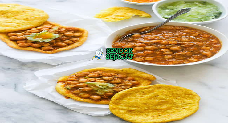 Doubles dengan roti renyah dan channa kental