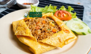 Nasi Goreng Pattaya dengan omelet tipis dan topping sambal