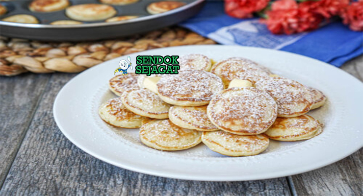 Poffertjes dengan butter leleh dan gula bubuk