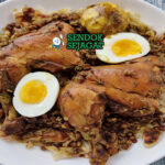 Rfissa dengan ayam, kuah lentil, dan msemen sobek