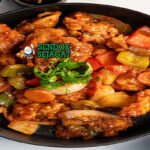 Chinese Sweet and Sour Pork dengan daging renyah dan saus kental