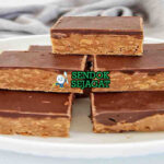 Tim Tam Slice dengan lapisan cokelat dan kelapa parut