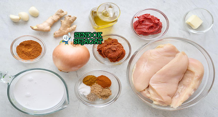 Bahan-bahan untuk Ayam Goreng Mentega, termasuk ayam potong dan mentega