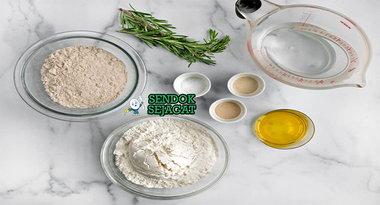 Bahan-bahan untuk Fougasse, termasuk tepung dan zaitun