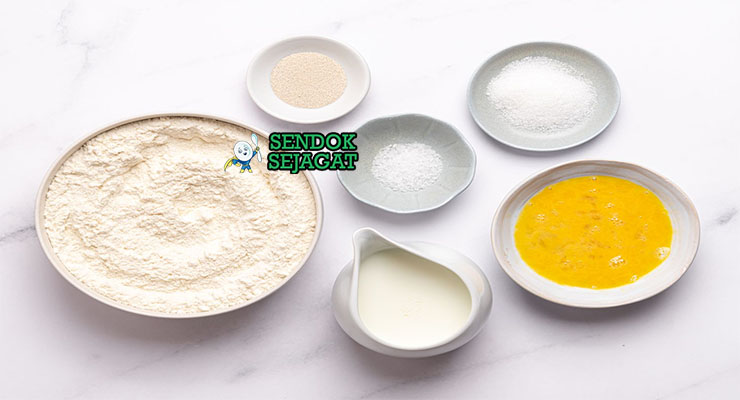 Bahan-bahan untuk Knedlíky, termasuk tepung roti dan susu hangat