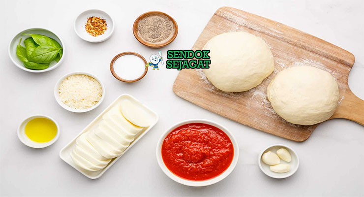Bahan-bahan untuk Pizza Margherita, termasuk tepung dan mozzarella segar