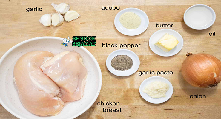Bahan-bahan untuk Spanish Pollo al Ajillo, termasuk ayam dan bawang putih