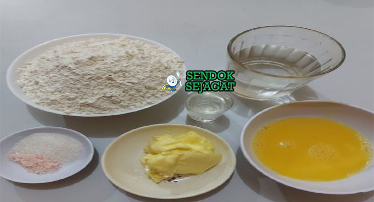 Bahan-bahan untuk Roti Canai, termasuk tepung dan ghee