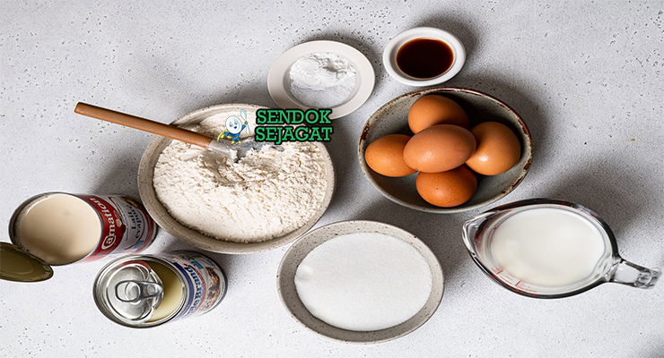 Bahan-bahan untuk Tres Leches Cake, termasuk susu dan telur