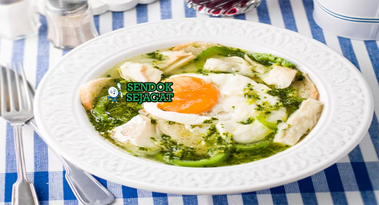 Açorda Gurih Khas Portugal Açorda dengan sup roti, telur, dan cilantro di mangkuk saji