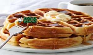 Belgian Waffles gula mutiara karamel gula bubuk buah di piring saji