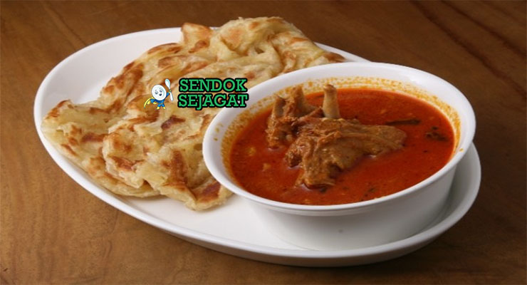 Roti Canai Flaky Gurih Khas Malaysia Roti Canai renyah lapis dengan saus kari ayam di piring saji
