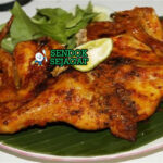 Ayam Bakar Limau panggang karamel bumbu kecap di piring saji