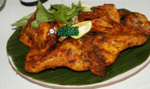 Ayam Bakar Limau panggang karamel bumbu kecap di piring saji