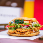 Bake and Shark sandwich roti bake gembung ikan goreng tumpuk lettuce nanas timun saus menetes